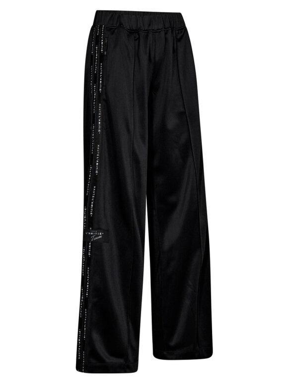 Haute L'amitié - Logo Tape Track Tall Pant Haute L'amitié - Logo Tape Track Tall Pant